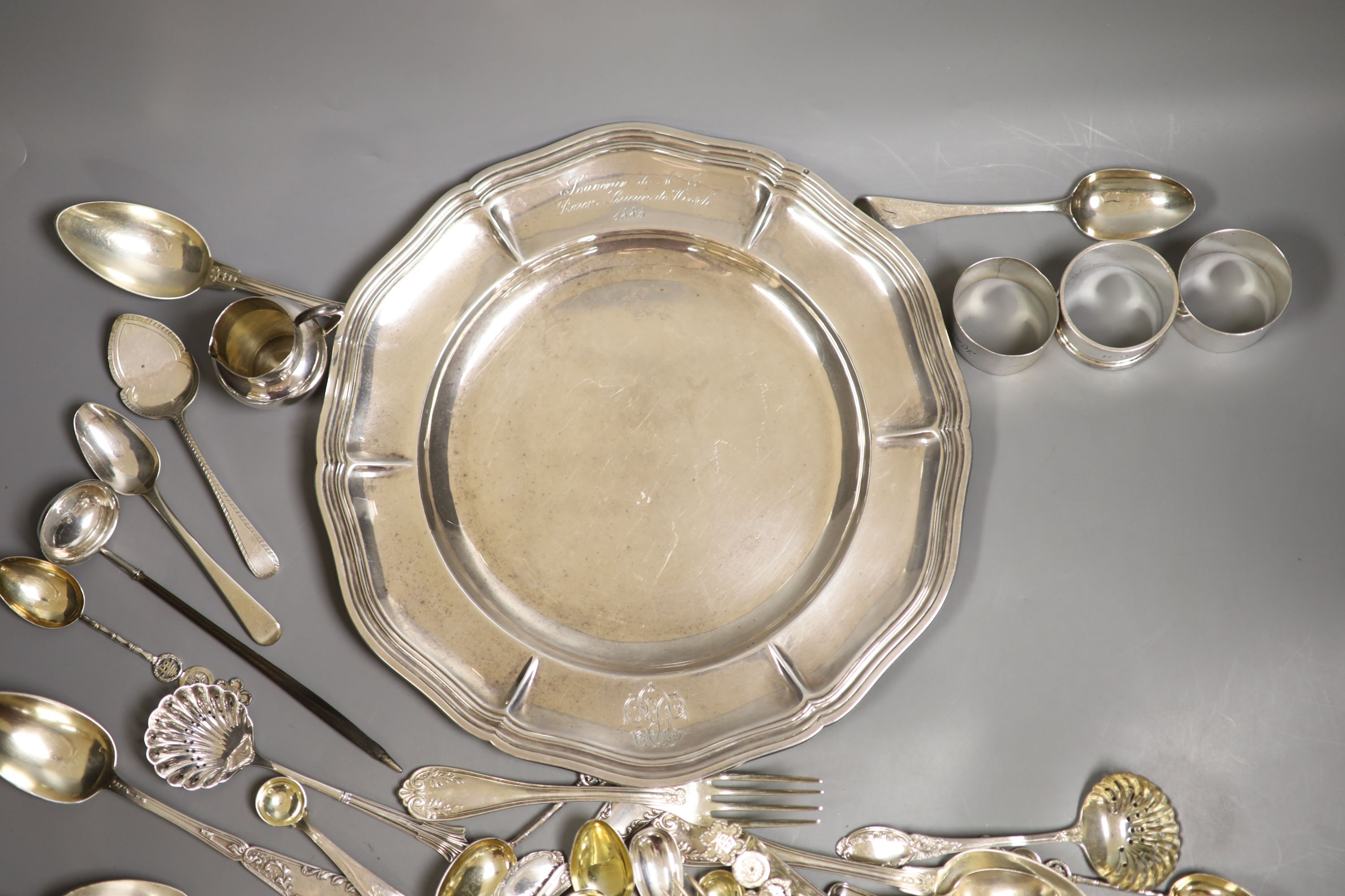 A group of assorted flatware, including some French and Chinese white metal and English silver and an Odiot 1885 white metal plate